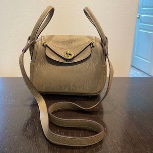 CUTE leather purse w gold buckle. Used only twice!!
